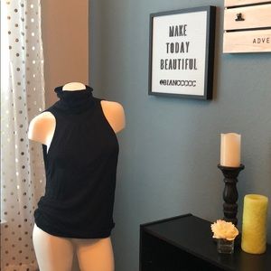 Backless/sleeveless turtleneck top